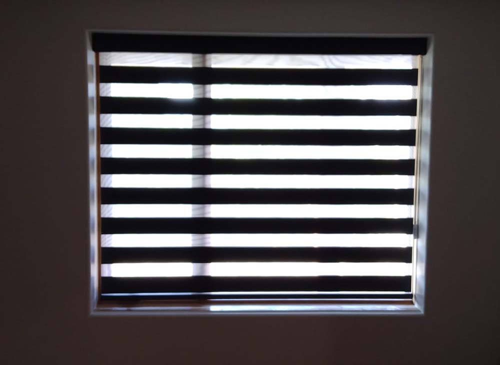 wide slat blinds supplied and installed by Crowsnest Blinds